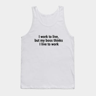 I work to live, but my boss thinks I live to work Black Tank Top